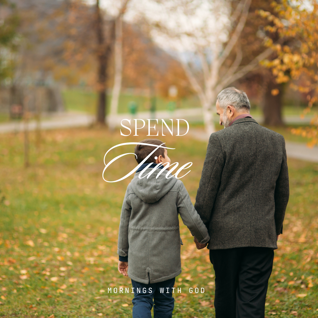 two people walking in park